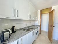 A kitchen or kitchenette at TORRE VALENCIA LEVANTE BEACH