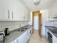 A kitchen or kitchenette at TORRE VALENCIA LEVANTE BEACH