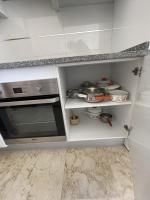A kitchen or kitchenette at TORRE VALENCIA LEVANTE BEACH