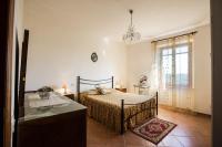 Posteľ alebo postele v izbe v ubytovaní Casa Guaitoli