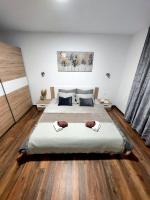 Posteľ alebo postele v izbe v ubytovaní Brand new apartment "Filip"