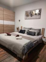 Posteľ alebo postele v izbe v ubytovaní Brand new apartment "Filip"