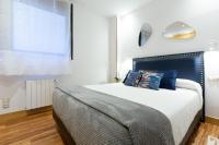 A bed or beds in a room at Unamuno by Bilbao Living