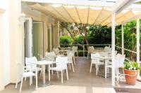 Restauracja lub miejsce do jedzenia w obiekcie Hotel Villa Fernanda