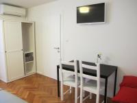 Televízia a/alebo spoločenská miestnosť v ubytovaní Fiorino Rooms Korčula