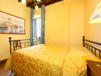 Posteľ alebo postele v izbe v ubytovaní Apartment Villa Grassina-7 by Interhome