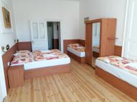 Postel nebo postele na pokoji v ubytování Hotel Morava