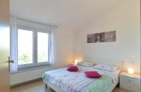Posteľ alebo postele v izbe v ubytovaní Apartments Jere 719