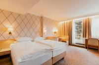 Postel nebo postele na pokoji v ubytování Hotel Scherer