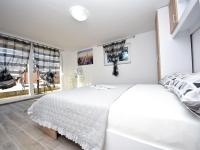Posteľ alebo postele v izbe v ubytovaní Holiday Home Tina & Tino by Interhome