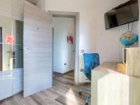 Televízia a/alebo spoločenská miestnosť v ubytovaní Holiday Home Villa Amaii by Interhome