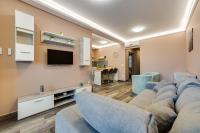 Televízia a/alebo spoločenská miestnosť v ubytovaní Forest Földvár Apartmanok By BLTN