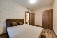 Posteľ alebo postele v izbe v ubytovaní Forest Földvár Apartmanok By BLTN