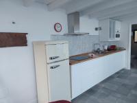 A kitchen or kitchenette at Bungalowmirador