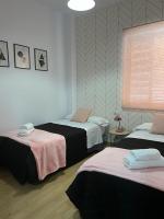 Posteľ alebo postele v izbe v ubytovaní Crisana Beach Málaga