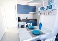 Kuchyň nebo kuchyňský kout v ubytování Sea Breeze Apartment 309