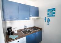 Kuchyň nebo kuchyňský kout v ubytování Sea Breeze Apartment 309