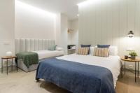 Postel nebo postele na pokoji v ubytování Prado Rooms 46 - Darya Living