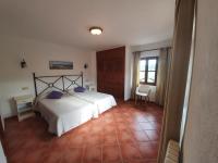 Postel nebo postele na pokoji v ubytování Villa Cal Apostol