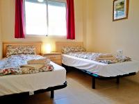 Postel nebo postele na pokoji v ubytování Alcala Blau 123 - Bajo con terraza en primera línea - ALBERT VILLAS