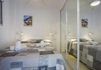 A bed or beds in a room at Apartamentos President 3ºD