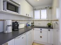 A kitchen or kitchenette at Apartamentos President 3ºD