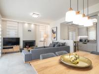 Televízia a/alebo spoločenská miestnosť v ubytovaní Utopia Luxury Villas