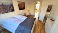 Postel nebo postele na pokoji v ubytování Apartment Blochmann-Cárre