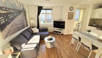 TV a/nebo společenská místnost v ubytování Apartment Blochmann-Cárre