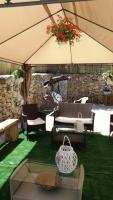 Posedenie v ubytovaní Appartamento in villa vita