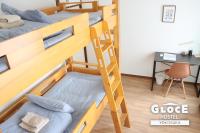 GLOCE 横須賀 シェアルーム NAVY BASE l Yokosuka Share room at NAVY BASEにあるベッド