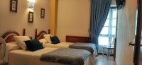 A bed or beds in a room at Posada Marina