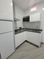 Kuchyňa alebo kuchynka v ubytovaní Apartamentos “Mar de Coral” Aguadulce