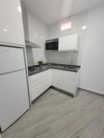 Kuchyňa alebo kuchynka v ubytovaní Apartamentos “Mar de Coral” Aguadulce