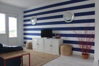 TV a/nebo společenská místnost v ubytování Bonita vivenda con jardín en playa Aguieira