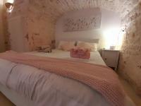 A bed or beds in a room at Dimora Morello