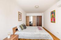 Postel nebo postele na pokoji v ubytování Matisse Hotflat