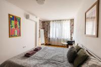 Postel nebo postele na pokoji v ubytování Matisse Hotflat