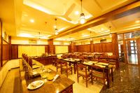 Hotel Guruvayur Darshanにあるレストランまたは飲食店