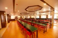Hotel Guruvayur Darshanにあるレストランまたは飲食店