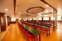 Hotel Guruvayur Darshanにあるレストランまたは飲食店