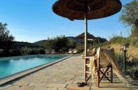 Bazén v ubytovaní Agriturismo Porta al Colle alebo v jeho blízkosti