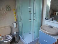 a bathroom with a shower and a toilet and a sink at L Imperatrice in Berck-sur-Mer