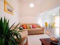 Posedenie v ubytovaní Lovely apartment with swimming pool