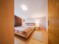 Posteľ alebo postele v izbe v ubytovaní Lovely apartment with swimming pool