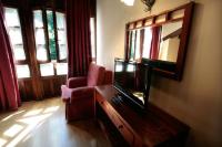 Hotel Rural Casa Cuetoにあるテレビまたはエンターテインメントセンター