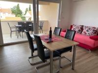 Posezení v ubytování Holiday apartment in Punat with loggia, air conditioning, WiFi, washing machine 4534-1