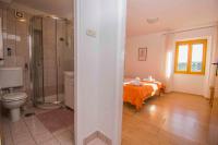 Kúpeľňa v ubytovaní Apartment Dobrinj 1