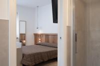 Posteľ alebo postele v izbe v ubytovaní Hotel Oliva