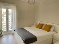 A bed or beds in a room at Xuloss Apartments 2